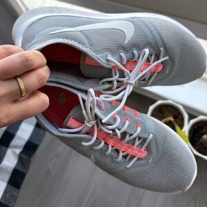 Nike like gray shoes with coral detailing